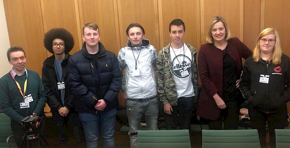 left to right: Scott Beeslee (teaching assistant) Isaac Emilien, Steven Lewis, Jack Wilson, Leo Jackson, Amber Rudd MP and Christine Anne Horsley