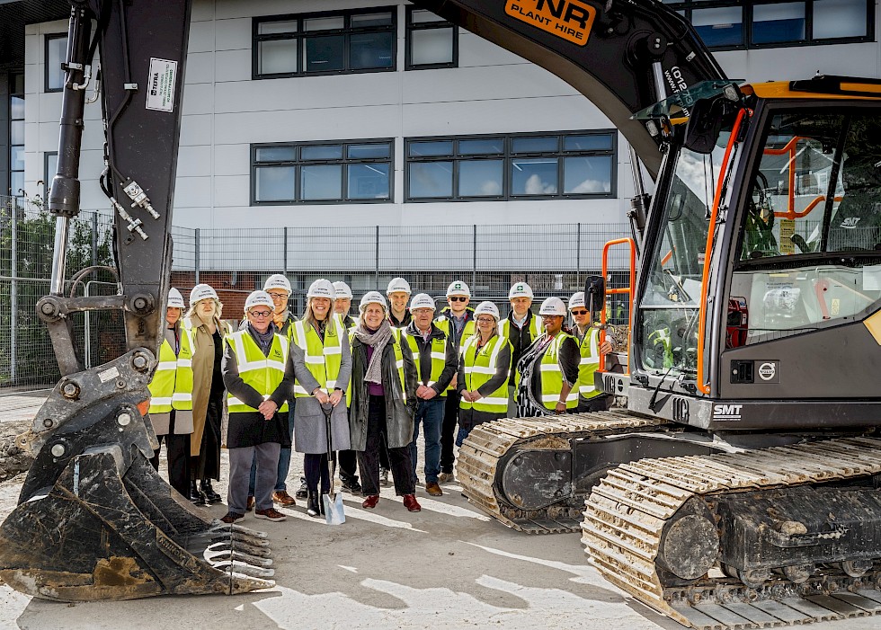 Rebecca Conroy, CEO & Principal, East Sussex College (middle) with Ian Mehrtens, Governor & Chair of the Board, East Sussex College (left) and Cllr Julia Hilton, Deputy Leader of Hastings Borough Council (right) breaking ground on the new Green Automotive Centre of Excellence site.