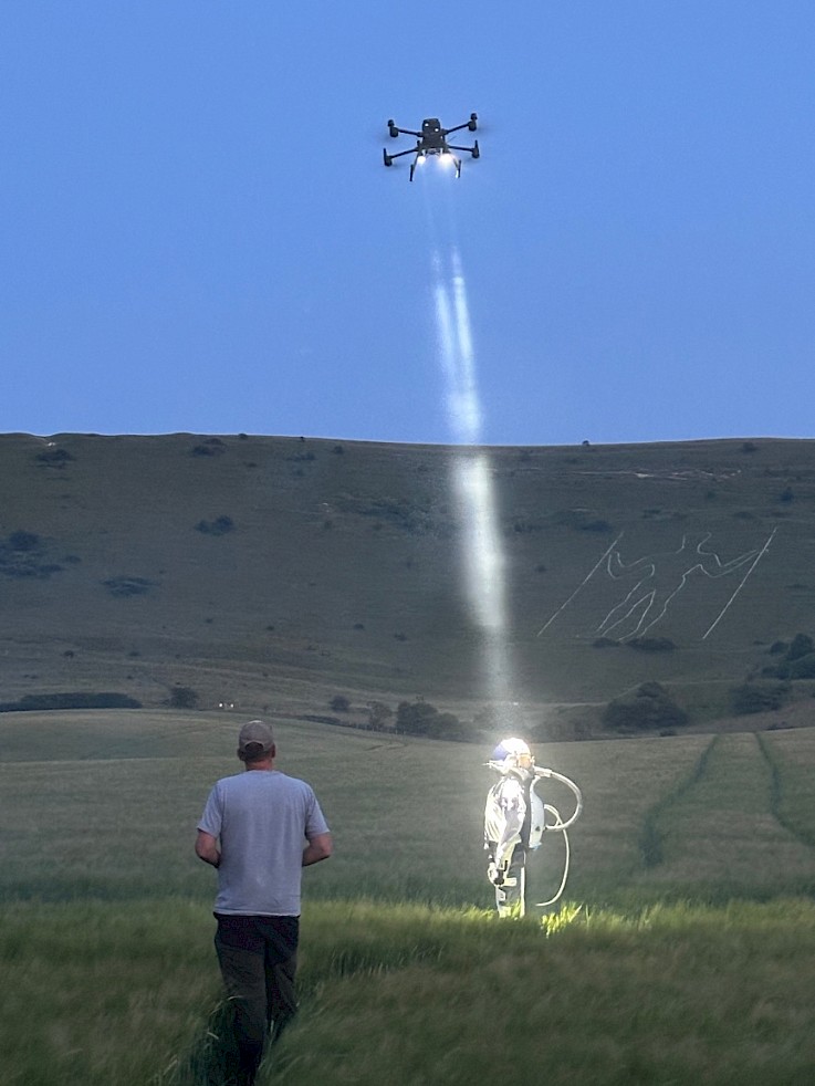 A drone flying above the landscape during filming
